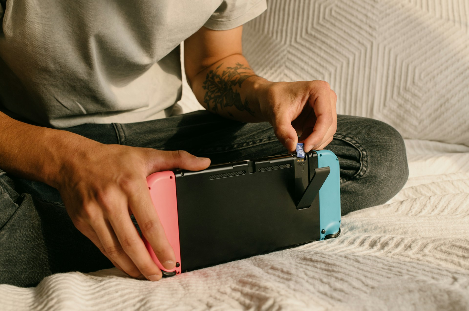 a person holding a laptop